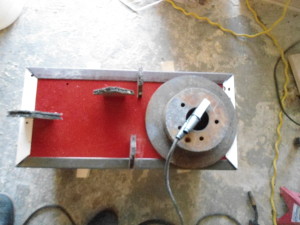 Rolling base for tool cabinet set up for tack welding