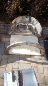Front along with inner and outer back segments cut out and placed in relation to the fire brick