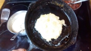 Whole wheat crepes - tilting the pan to distribute the batter