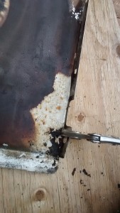 Bending tabs flat with vice-grips