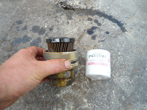 Oil filter styles - replaceable cartridge style on the left, spin on canister on the right