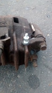 New brake bleeder screw installed salvaging the brake caliper