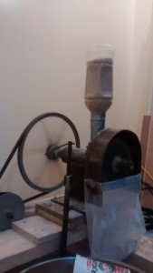 Grain mill power drive powering through a few pounds of whole wheat