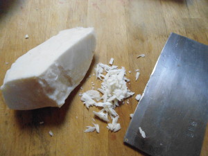 Pieces of tallow sliced off large block