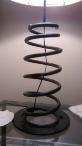 Lower portion of the lamp - showing the welds between the disk and the spring